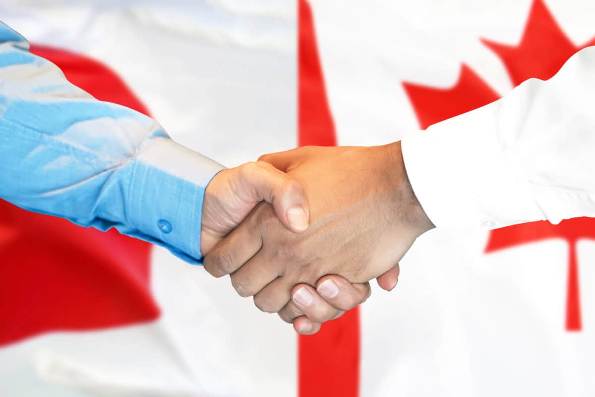 $Guide to obtaining Canadian residence permit: on table
