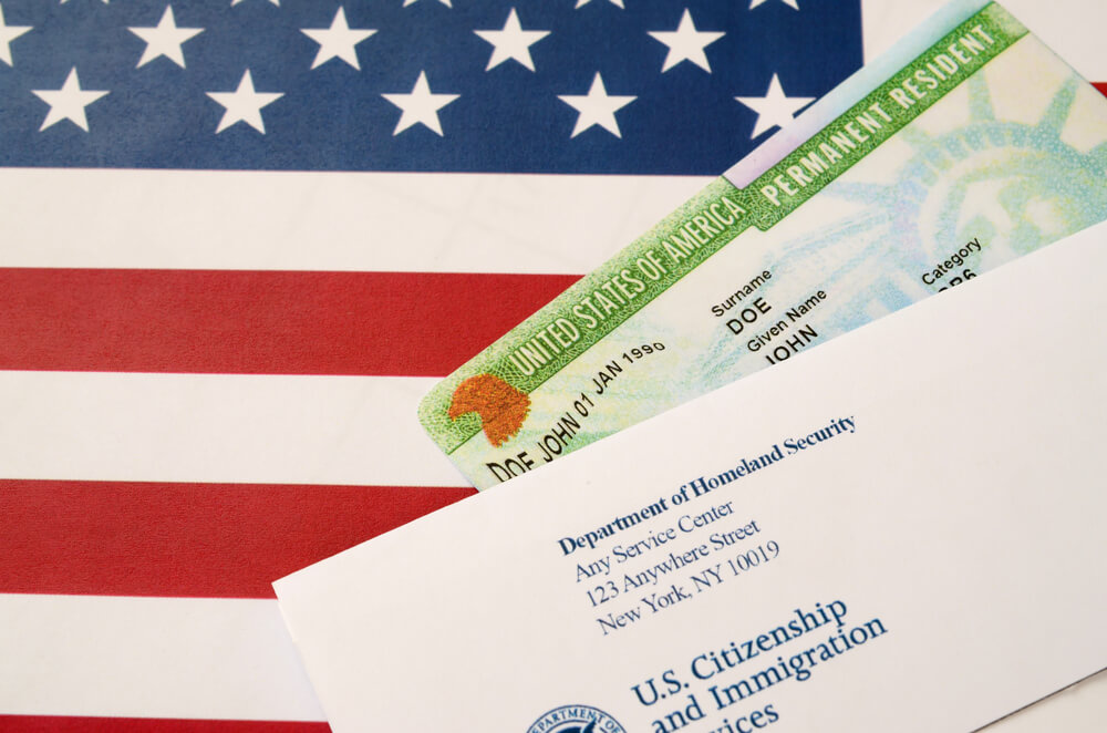 $Guide to Obtaining a U.S. Residence Permit: on table