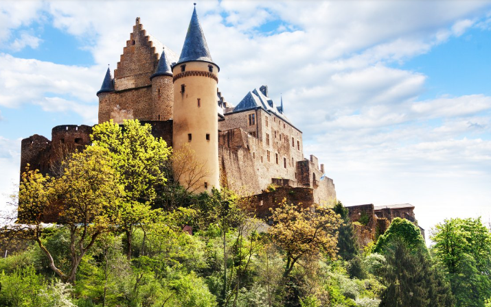 $Guide to Obtaining a Luxembourg Residence Permit on table